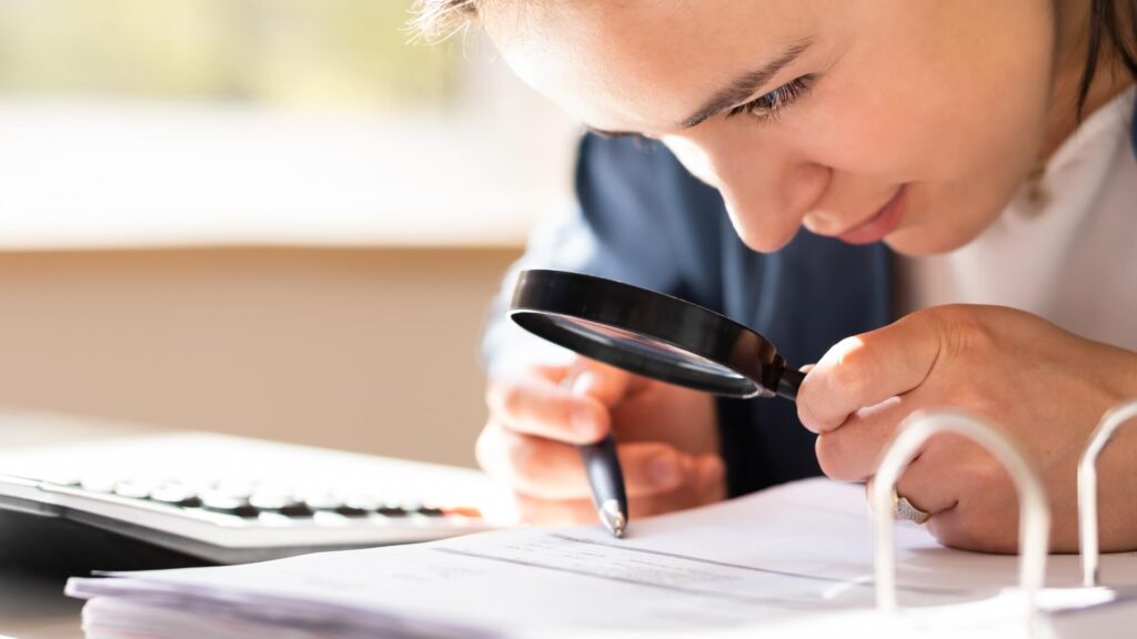Female accountant performing a tax investigation